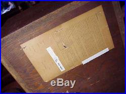 AR-3a vintage speakers with grills and paperwork on back of speakers